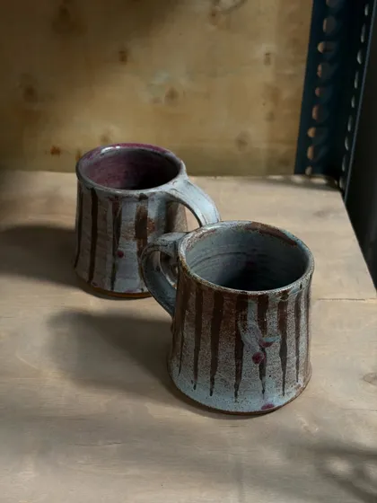 These mugs are a classic design I learned during my student days. While my style has evolved, I still love recreating these forms, as each artist brings their own unique touch to a shared tradition.
