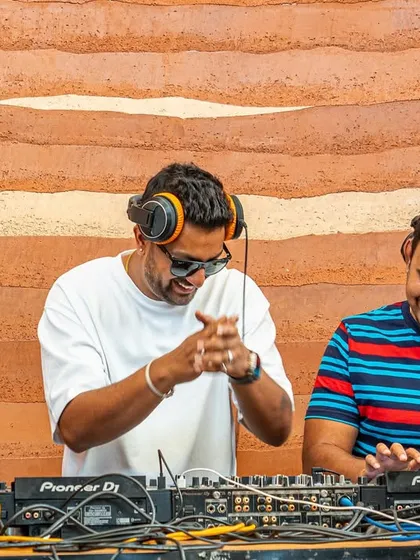 Sharing a laugh with a friend while playing a Sunday brunch set at Lumara. B2B sets are always fun, bouncing ideas and energy off each other.