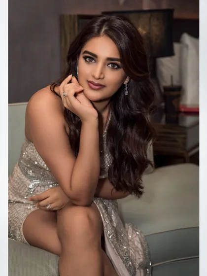 A glamour portrait of actress Nidhhi Agerwal, showcasing a sophisticated and polished look for an event. My process involves careful lighting and retouching to create magazine-quality images that highlight the subject's personality.