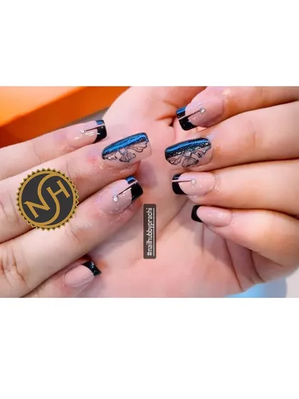 A sophisticated and artistic French manicure. This design features a short, square shape with black tips, delicate butterfly line art, and a single rhinestone accent.