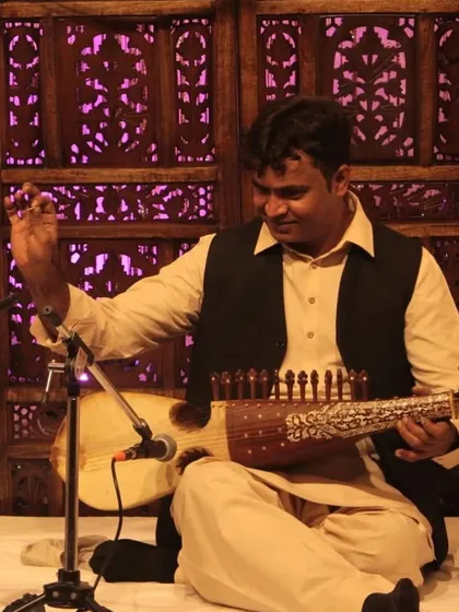 The Sarod, a beautiful stringed instrument, being played by Sh. Imran Khan at our baithak. We host a variety of instrumental and vocal performances to showcase the diversity of Hindustani music.