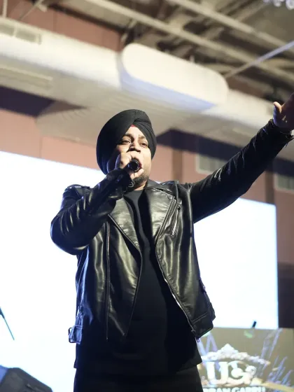 A close up of the lead singer during the Sangeet night performance.