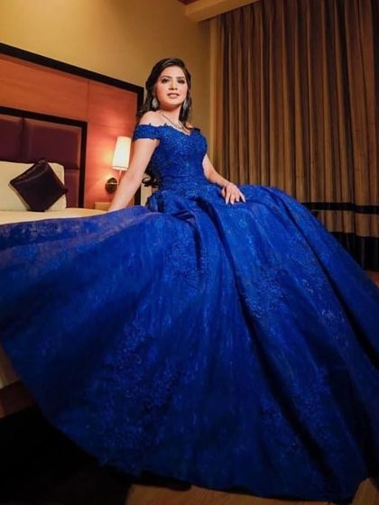 Something blue. This client chose a vibrant royal blue ball gown for her event, and I created a classic glam look to match.