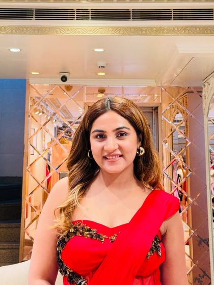 A closer look at the embellished corset blouse. The intricate work adds a touch of luxury, while the modern cut keeps the look fresh and stylish. I recommend soft curls and glowing skin to complete this look.