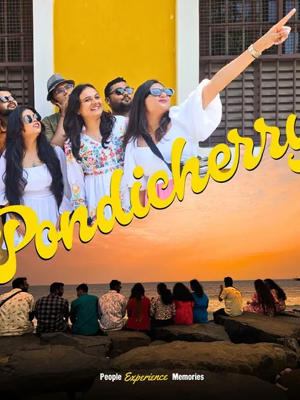 A perfect Pondicherry postcard. A group of travelers points towards a sight, full of curiosity and joy. My trips are about exploring the French-inspired architecture and soaking in the unique vibe of this town.