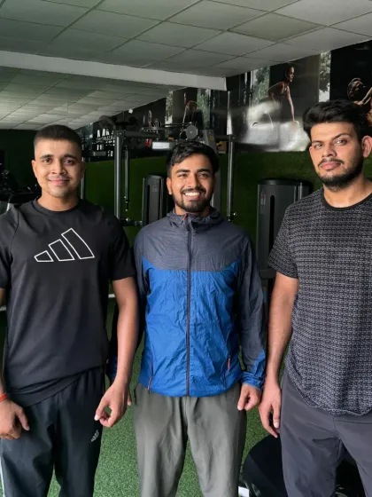 With two of my clients at the gym. Building a strong and supportive fitness community.