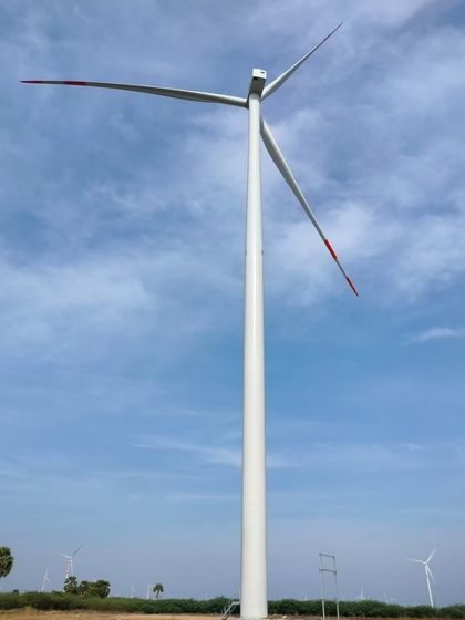 A ground-level view of a newly installed wind turbine at our Project Shiva site in Tamil Nadu. By integrating wind power, we enhance our clean energy offerings and pave the way for a more resilient and sustainable energy future for India's C&I sector.