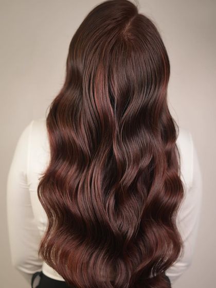 A beautiful example of our Cherry Brunette shade. This color infuses a deep brown base with subtle, rich red tones for a unique and sophisticated finish.