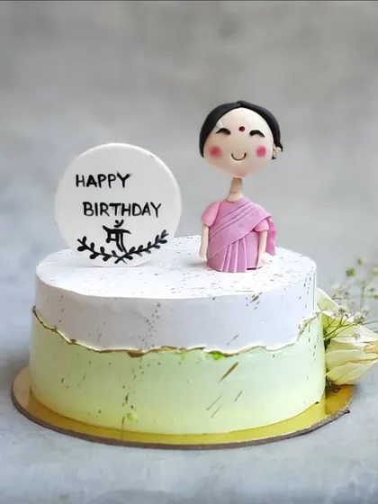 For the one who deserves the world. This elegant fault-line cake with a custom fondant topper was made for a very special mom's birthday. I can create personalized toppers to capture the essence of your loved ones.