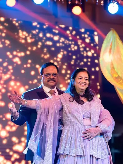 The parents of the bride or groom showing off their moves on the dance floor. A wedding is a celebration for the entire family, and we love seeing everyone get involved.
