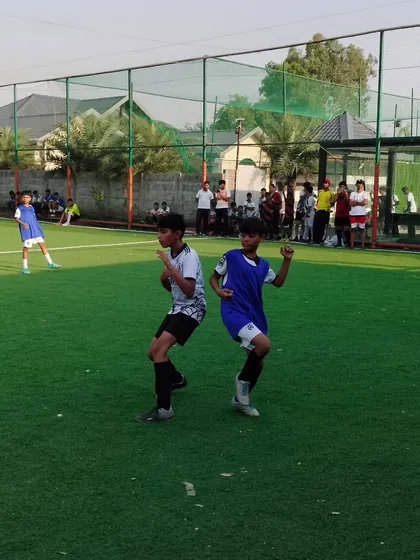 The joy of the game, captured in a spontaneous celebration between two of our players during a match.