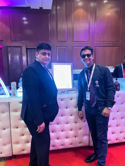 With Dr. Sudhir Budlani, who trusted us with his corporate event. We are proud to build lasting relationships with our corporate clients.