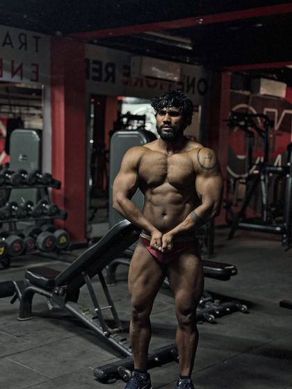 Ready for war. A front relaxed pose, but there is nothing relaxed about this condition. This is peak week.