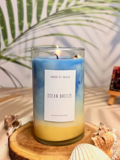 Can't go to the beach? I'll bring the beach to you. My Ocean Breeze candle is layered to look like the shore and is infused with a fresh, breezy scent that feels like a mini-vacation in a jar.