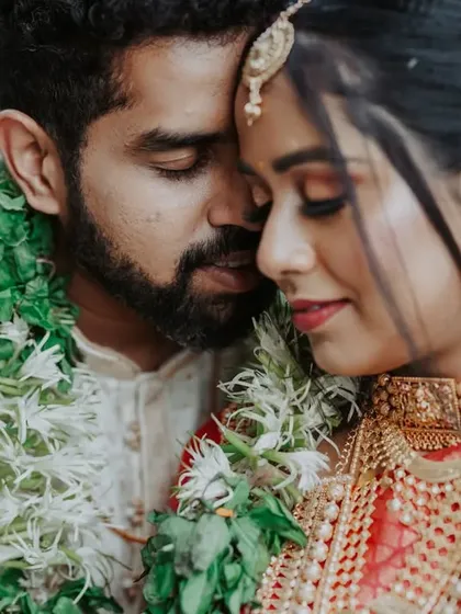 A close, emotional portrait from a South Indian wedding. This image highlights my ability to capture the serene beauty and deep connection inherent in different cultural ceremonies.