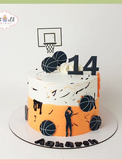 A slam dunk birthday for a 14-year-old basketball fan. This cake features basketballs, a hoop, and player silhouettes in a cool orange and white design.