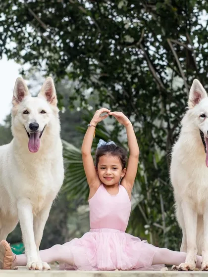 This was a magical shoot combining the grace of a young ballet dancer with her two majestic White Swiss Shepherds. I love bringing unique and creative visions to life.