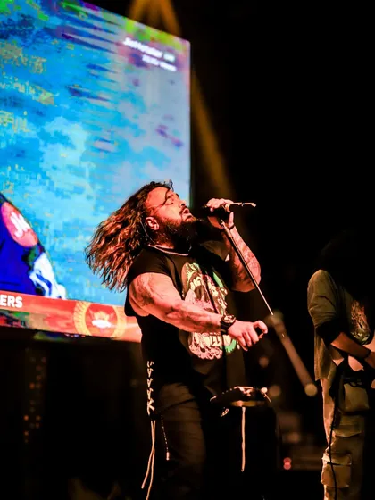 Our frontman pouring his heart and soul into every note, with his hair flying as he sings.