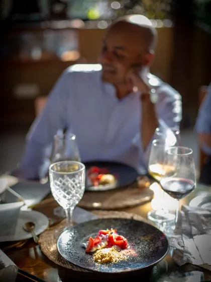 A guest enjoying a plated dessert. The satisfaction of my diners is the ultimate reward for the passion and effort poured into every dish.