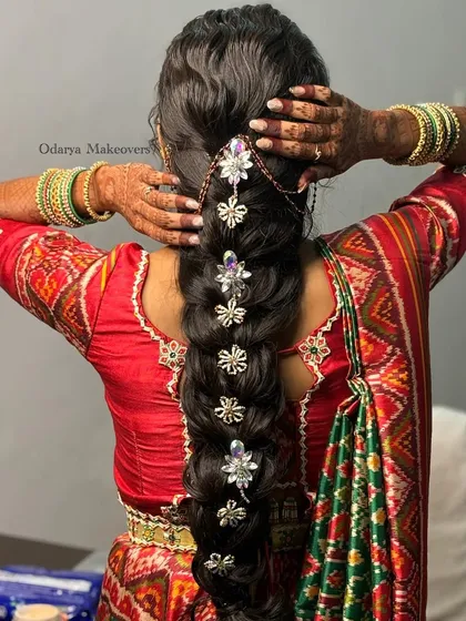A full view of the diamond-studded bridal braid. This is a modern and glamorous take on the traditional wedding braid, perfect for the bride who wants to sparkle.