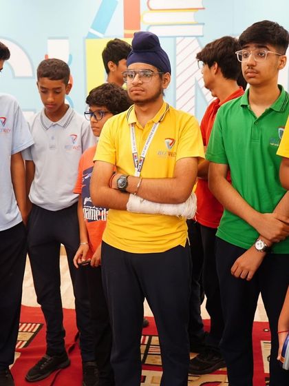 Students attentively listen during a workshop on sustainable living. We cover a range of topics, from the importance of local biodiversity to practical ways they can reduce their carbon footprint at home.