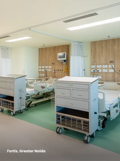 In this patient ward at Fortis, Greater Noida, we focused on creating a healing and efficient environment. The design includes durable, anti-microbial flooring, integrated medical gas headwalls, and mobile clinical carts, all organized to optimize nursing workflows and patient comfort.