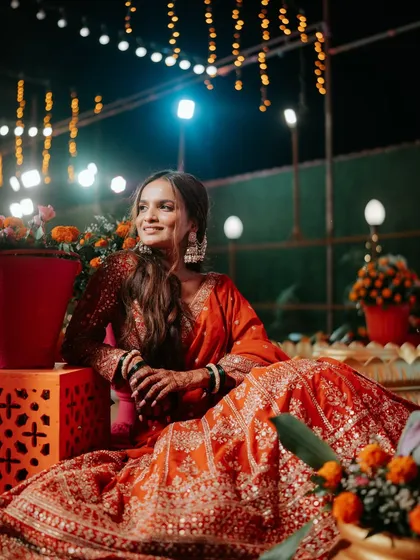 Draped in tradition and glowing with love. This bride steals the spotlight effortlessly during her Haldi ceremony.