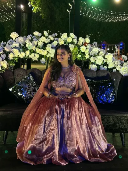 Another shot of me seated at the beautifully decorated Sangeet venue, ready for a night of glamour.