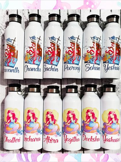 I can create different designs for the same theme. For this mermaid party, I made mermaid-themed bottles for the girls and pirate-themed bottles for the boys, all personalized with their names.