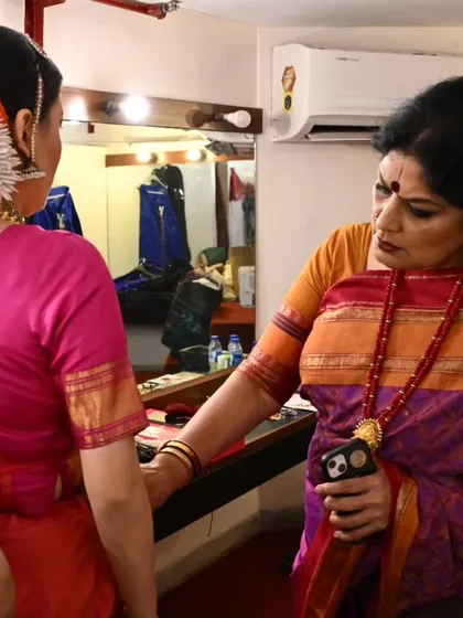 A final check backstage with my student Stuti Mukherjee. These last-minute words of encouragement are part of the personal mentorship I provide.