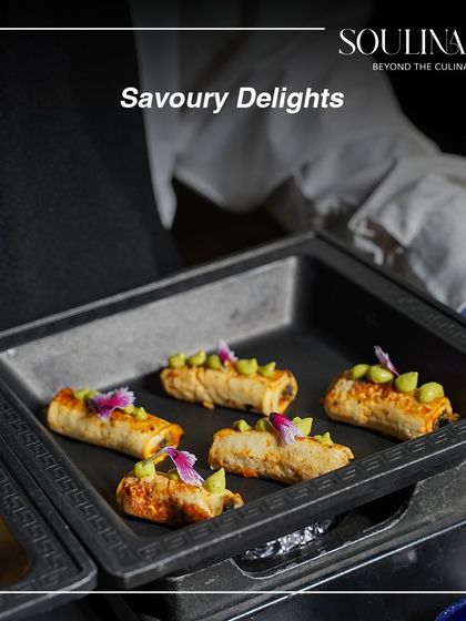 Savoury delights in the form of delicate rolls, garnished with edamame and edible flowers. A testament to our commitment to artisanal elegance.