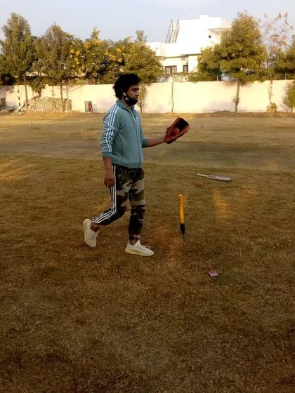 Coach Mithun Manhas during a break in a fielding session. His presence provides inspiration and a clear example of the professionalism required to play at a high level.