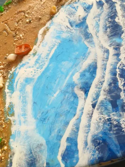 Another angle of the heart-shaped ocean art, showing the beautiful wave details.