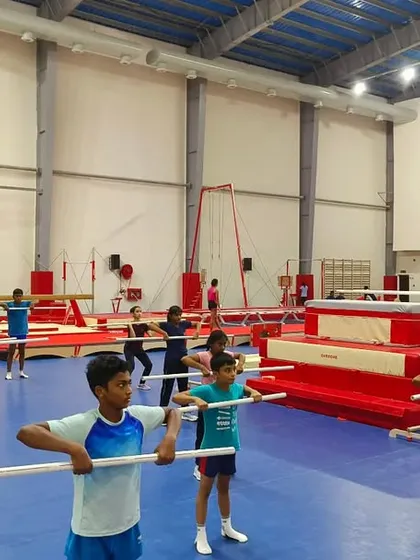 A wide shot of a strength and conditioning session with young gymnasts. It's rewarding to see their focus and dedication as they learn the fundamentals of training.