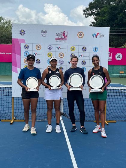 Posing with their hard-earned trophies at the Mysore Open. This image shows both the winners and finalists, highlighting the high level of competition our players face and excel in.