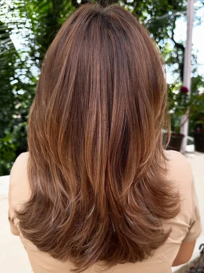 A collection of my hair transformations featuring beautiful warm tones. From caramel to copper, these colors are perfect for adding a sun-kissed glow and dimension.