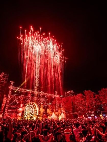 The grand finale of Zedd's show, with red fireworks lighting up the night sky. I always ensure my concerts end on a spectacular high note.