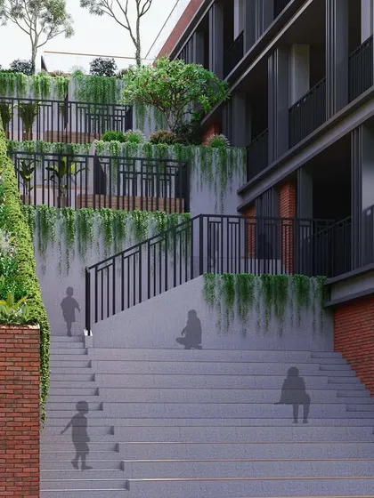 A close-up of the "green stairs" at the MG Suncity School, where landscaping is integrated directly into the circulation path.