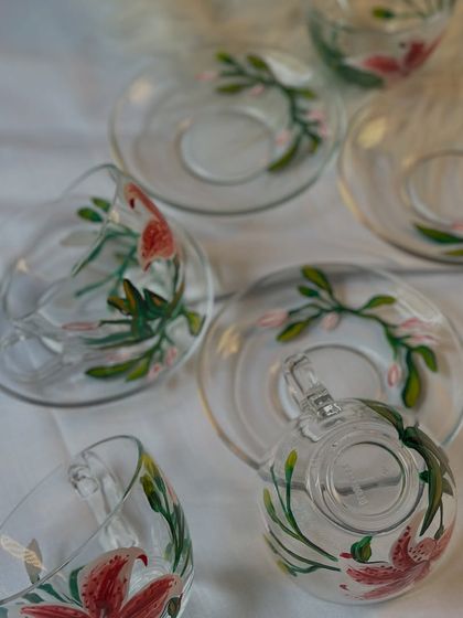 A full set of our hand-painted lily and floral teacups and saucers. You can choose your favorite style, with or without the saucer, to match your personal taste.
