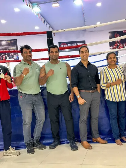 The complete team celebrating the historic win of our brother-sister duo at the Maharashtra State Boxing Championships.