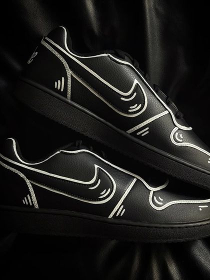 A top-down view of the cartoon-style Nike Ebernons.