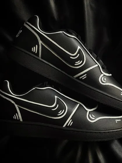 A top-down view of the cartoon-style Nike Ebernons.