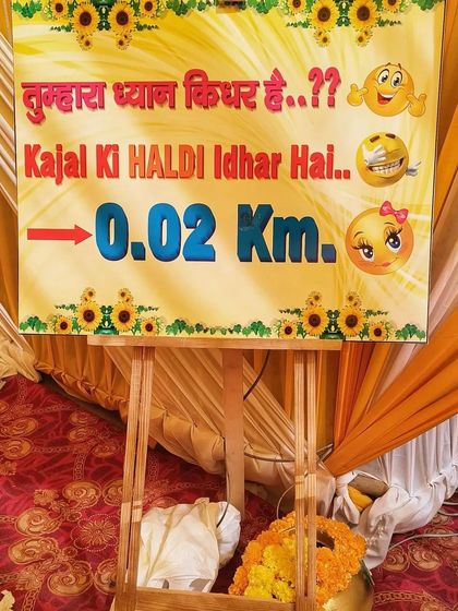 I love adding a bit of humor to the decor. This quirky sign for a Haldi ceremony is sure to make guests smile as they find their way to the party.