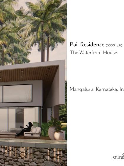 This view of the Pai Residence, a 5000 sq.ft waterfront home, shows the private bedroom deck overlooking the infinity pool and the areca nut plantations beyond. The design prioritizes privacy and a direct connection to the stunning natural surroundings.