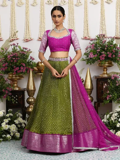The complete look, a statement designer couture set that is both regal and vibrant.
