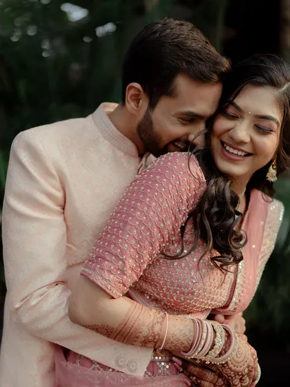 A candid and affectionate moment from Prachi and Shubham's engagement. His playful nuzzle and her happy smile capture the genuine love and comfort they share.