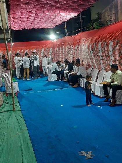 Guests seated inside the pandal at the Vashi event. I can provide both plastic chairs and chairs with covers.