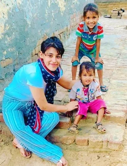 A quiet moment with children in the community. My fight for a better future is for them, to ensure they grow up in a society that respects and protects everyone.