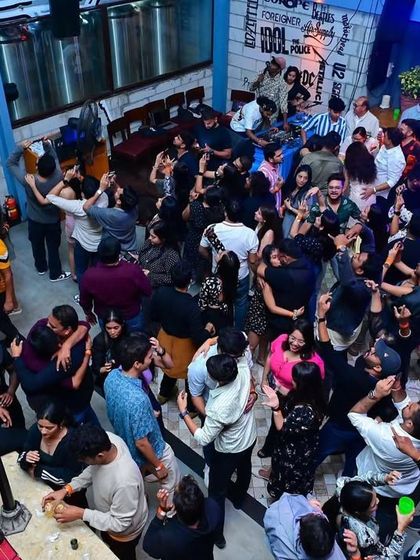 An aerial shot of the packed dance floor during a New Year's Eve party at Vapour. The energy was absolutely electric as we counted down to midnight.