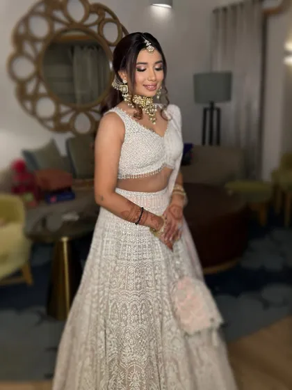 A beautiful candid of Vasvi, showing off her modern princess glam. The soft pink makeup is fresh and youthful.